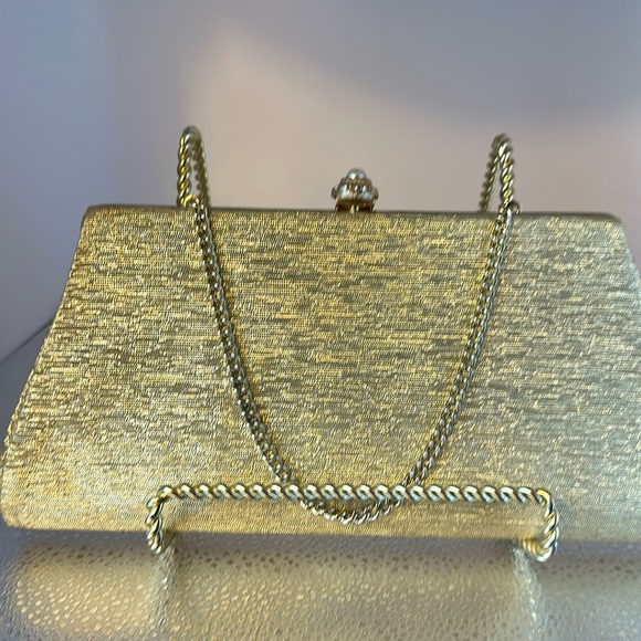 Beautiful handbag or clutch. Gold colored. The snap has a faux pearl on … - Picture 1 of 5